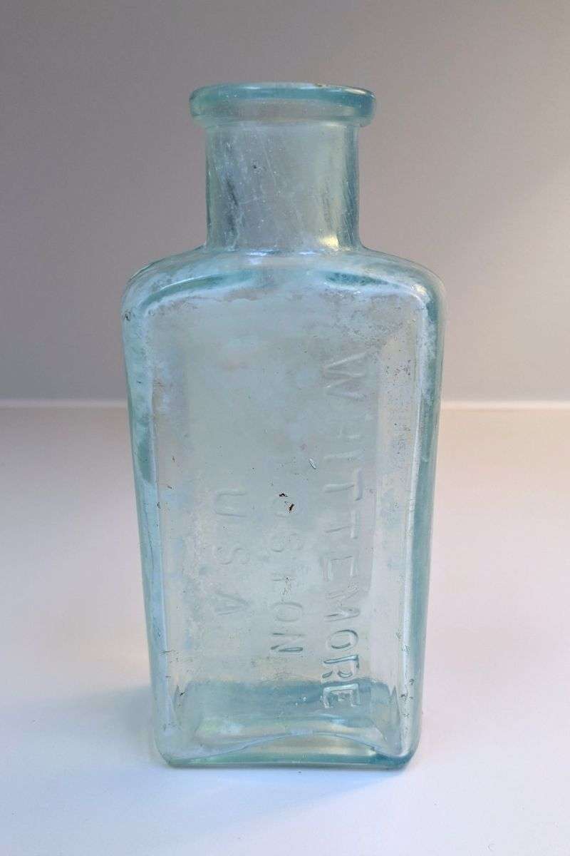 Teal glass antique Whittemore Shoe Polish bottle