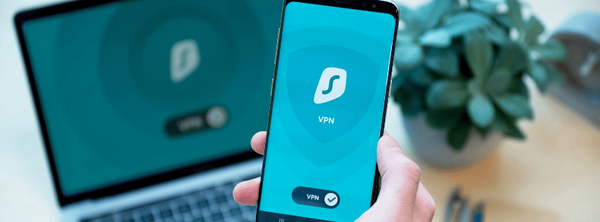 A laptop and mobile phone open to a vpn screen